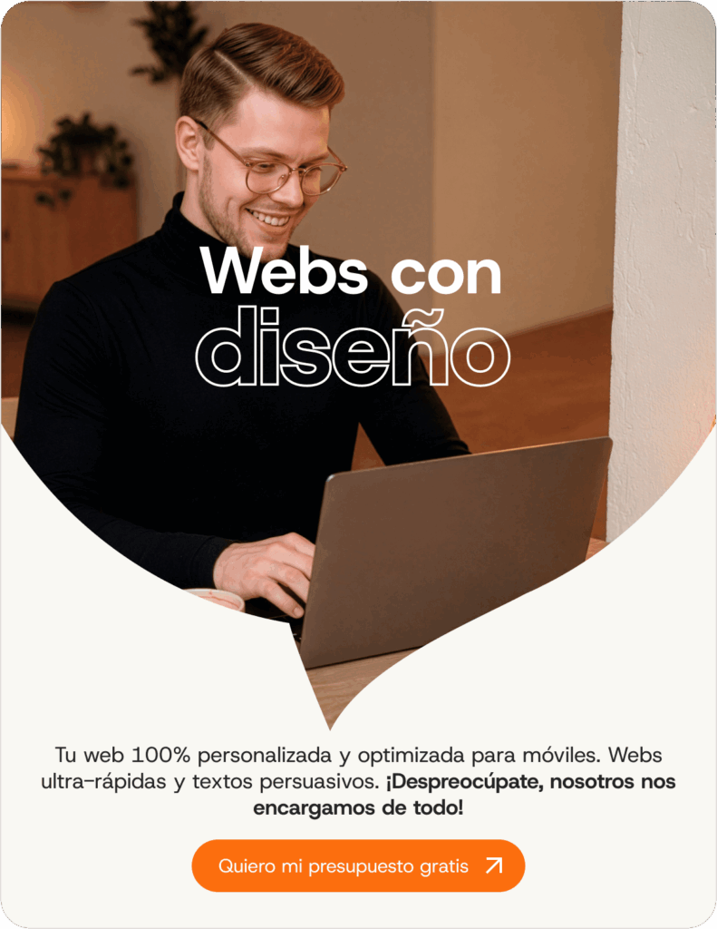 Hombre con gafas usando portátil para diseño de páginas web
